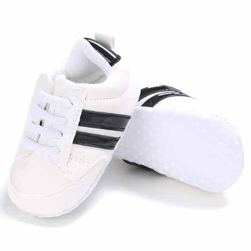 Chaussure sportive bébé blanche et noire avec semelle antidérapant