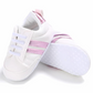 Chaussure sportive bébé blanche et rose avec semelle antidérapant