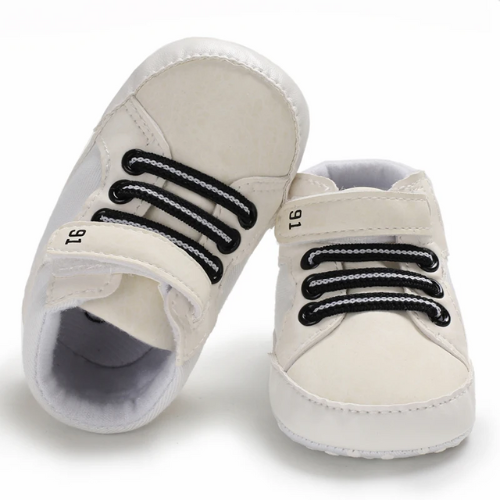 Tennis bébé blanc lacets noirs doublure chaude