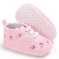 chaussure bébé rose motif fleur